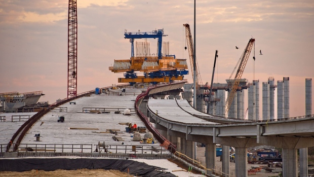 Construction on the Corpus Christi Harbor Bridge and ramps that will connect to Interstate 37 in Corpus Christi, Texas, U.S., on Friday, April 2, 2021. Republicans may be ready to support limited infrastructure funding in President Biden's spending proposal, which would require scaling back the $2.25 trillion plan by more than two thirds, a senior GOP senator said. Photographer: Eddie Seal/Bloomberg
