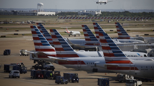 American Airlines planes. Photographer: Patrick T. Fallon/Bloomberg