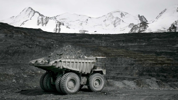 A truck loaded with gold ore heads towards the grinding mill of the Kumtor mine, in the Tien Shan mountain range, in Kyrgyzstan.