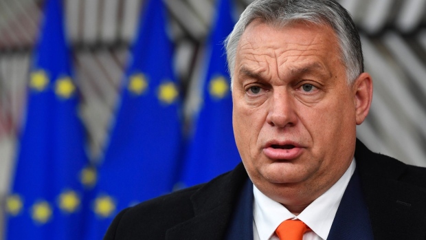 Viktor Orban, Hungary's prime minister, speaks to journalists as he arrives at a European Union (EU) leaders summit in Brussels, Belgium, on Thursday, Dec. 10, 2020. EU leaders will likely approve today a landmark stimulus package, after Germany brokered a compromise with Hungary and Poland to lift their veto over the deal.