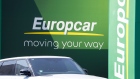 A Range Rover sports utility vehicle stands parked beside a Europcar Mobility Group logo at the car rental company's depot in Frankfurt, Germany, on Wednesday, June 24, 2020. Volkswagen AG is exploring an offer for Europcar , according to people familiar with the matter. Photographer: Alex Kraus/Bloomberg