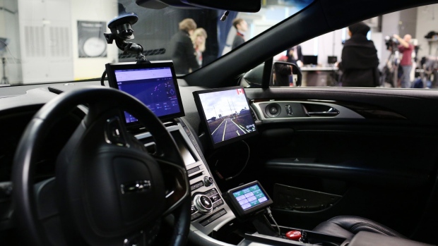 The interior of a Ford Motor Co. Lincoln MKZ vehicle with a Blackberry Ltd. autonomous driving system installed is seen at the BlackBerry QNX headquarters in Ottawa, Ontario, Canada, on Friday, Feb. 15, 2019. The Canadian government is pledging C$40 million ($30 million) in funding for BlackBerry to fund research and hiring in autonomous vehicles. Photographer: David Kawai/Bloomberg