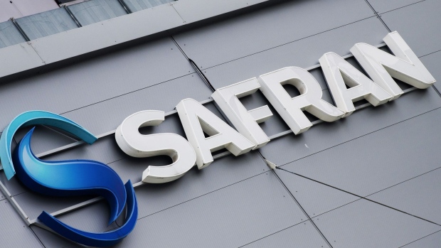 A Safran SA logo on the exterior of the company's aircraft engine component plant in Gennevilliers, France, on Wednesday, March 17, 2021. The Gennevilliers plant is gearing up for the future by investing in the development of new 3D modeling software and new production processes, according to Safran's website. Photographer: Nathan Laine/Bloomberg