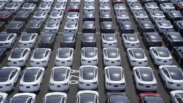 Tesla Inc. vehicles in a parking lot after arriving at a port in Yokohama, Japan, on Monday, May 10, 2021. Tesla sold a record of almost 185,000 vehicles in the first three months of the year despite having issues rolling out new versions of the Model S and X.