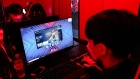 A gamer plays the League of Legends computer game at an esports hotel E-Zone Denno Kukan, operated by Sanyu Co., in Osaka, Japan, on Saturday, Oct. 24, 2020. The 90-bed hotel in the Nihonbashi district of Osaka has three floors dedicated to esports gaming with live-stream equipment. Photographer: Buddhika Weerasinghe/Bloomberg
