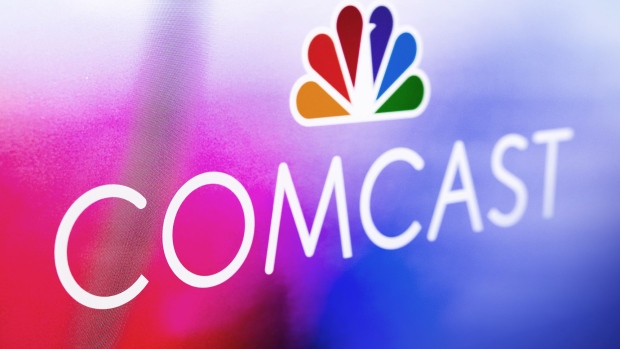 PHILADELPHIA, PA - APRIL 13: In this photo illustration, A Comcast logo is displayed at Comcast Center on April 13, 2021 in Philadelphia, Pennsylvania. Comcast Corporation will host a conference call with the financial community to discuss financial results for the first quarter on Thursday, April 29, 2021 at 8:30 a.m. Eastern Time (ET). Comcast is a global media and technology company principally focused on broadband, aggregation, and streaming with over 56 million customer relationships across the United States and Europe, through its Xfinity, Comcast Business, and Sky brands. It also creates, distributes, and streams entertainment, sports, and news through Universal Filmed Entertainment Group, Universal Studio Group, Sky Studios, the NBC and Telemundo broadcast networks, multiple cable networks, Peacock, NBCUniversal News Group, NBC Sports, Sky News, and Sky Sports; and provide experiences at Universal Parks and Resorts in the United States and Asia. (Photo by Jeff Fusco/Getty Images for Comcast)