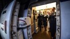 ISTANBUL, TURKEY - APRIL 06: Crew of last flight of Turkish Airlines plane from Ataturk airport waves for a photograph in the cabin on April 06, 2019 in Istanbul, Turkey. Ataturk Airport was opened in 1953 and was the first international airport in Istanbul. It was named after Mustafa Kemal Ataturk the founder of modern Turkey. The airport was scheduled for closure at the completion of Istanbul New Airport. Ataturk Airport will be shut down at 3am on April 6th, with all operations moving to the new airport. The move initiated by Turkish Airlines and TAV will be the biggest logistical operation in aviation history. The operation will take 45 hours and 686 trucks will move more than 10.000 pieces of equipment. The last flight from Ataturk airport will be to Singapore at 2am after which the airport will be officially closed. The first phase of the Istanbul New Airport was officially opened in October 2018 and once all four phases are complete will have an estimated annual passenger capacity of 90 million, making it one of the largest airports in the world. (Photo by Burak Kara/Getty Images)