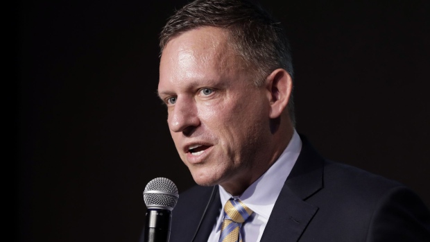Peter Thiel, co-founder and chairman of Palantir Technologies Inc., speaks during a news conference in Tokyo, Japan, on Monday, Nov. 18, 2019. The billionaire entrepreneur was in Japan to unveil a $150 million, 50-50 joint venture with local financial services firm Sompo Holdings Inc. Palantir Technologies Japan Co. will target government and public sector customers, emphasizing health and cybersecurity initially.