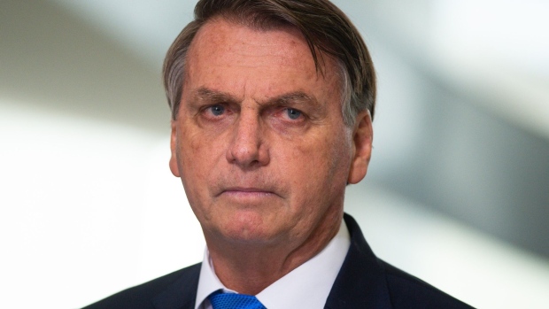 Jair Bolsonaro, Brazil's president, pauses while speaking during a news conference at the Planalto Palace in Brasilia, Brazil, on Wednesday, March 31, 2021. Commanders of Brazil's army, navy and air force were fired on Tuesday after Bolsonaro dismissed his defense chief as part of a broader cabinet restructuring.