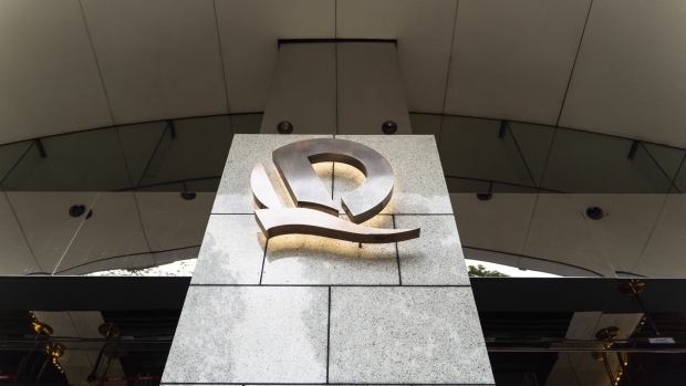 The China Evergrande Group logo is displayed in front of the China Evergrande Centre in Hong Kong, China, on Friday, Sept. 25, 2020. Photographer: Chan Long Hei/Bloomberg