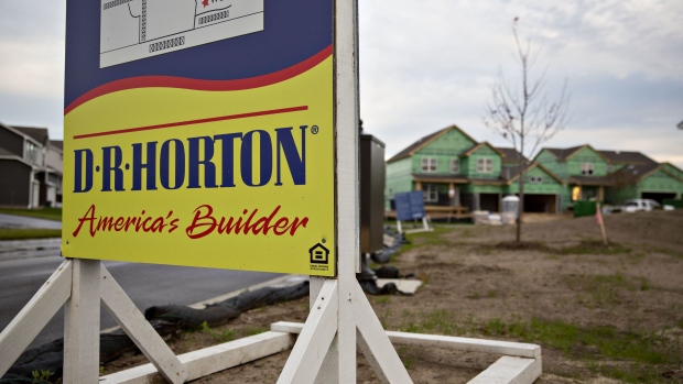 D.R. Horton Inc. signage stands in front of homes under construction at the Eastridge Woods development in Cottage Grove, Minnesota, U.S., on Friday, Oct. 19, 2018. D.R. Horton Inc. is scheduled to release earning figures on November 7th. Photographer: Daniel Acker/Bloomberg