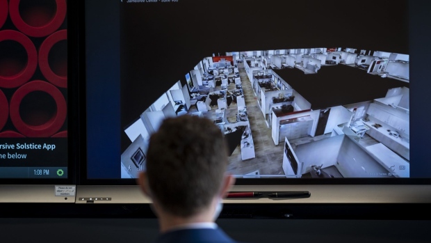 Matterport, a secure product used to show clients spaces virtually, is demonstrated at a JLL office in the Aon Center in Chicago, Illinois, U.S., on Thursday, June 24, 2020. After a three-month mandatory hiatus, corporations and their employees have largely adjusted to working from home successfully, but surveys suggest workers having a desire to get back to normal routines over working from home permanently. Photographer: Christopher Dilts/Bloomberg