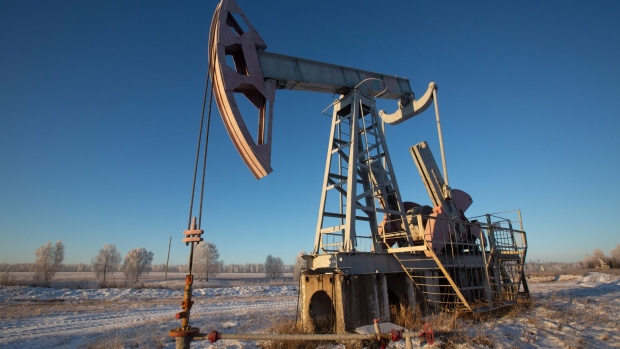 An oil pumping jack, also known as a "nodding donkey", in an oilfield near Dyurtyuli, in the Republic of Bashkortostan, Russia, on Thursday, Nov. 19, 2020. The flaring coronavirus outbreak will be a key issue for OPEC+ when it meets at the end of the month to decide on whether to delay a planned easing of cuts early next year. Photographer: Andrey Rudakov/Bloomberg