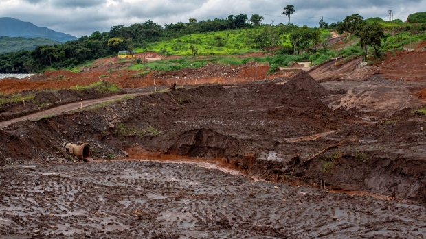 Mud from the Vale SA dam break is seen in a valley in Brumadinho, Minas Gerais state, Brazil, on Tuesday, Jan. 21, 2020. Nearly one year ago, a Brazilian dam operated by iron ore miner Vale gave way to a tsunami of mining sludge that buried part of a town and killed 270 people. CEO Fabio Schvartsman has stepped down, and prosecutors have charged him along with 10 others with homicide. Photographer: Victor Moriyama/Bloomberg