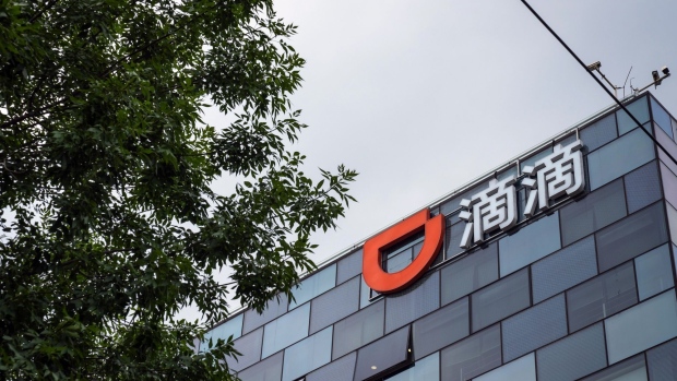 A logo on the Didi Global Inc. headquarters in Beijing, China, on Monday, July 5, 2021. China expanded its latest crackdown on the technology industry beyond Didi to include two other companies that recently listed in New York, dealing a blow to global investors while tightening the government’s grip on sensitive online data.