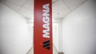 Magna International Inc. signage sits on display inside the company's Polycon Industries auto parts manufacturing facility in Guelph, Ontario, Canada, on Thursday, Aug. 30, 2018. Canadian stocks and the dollar extended gains Monday on news of a U.S.-Mexican trade agreement, shrugging off U.S. President Donald Trump's threats that Canada might be frozen out and instead face auto tariffs. Photographer: Cole Burston/Bloomberg