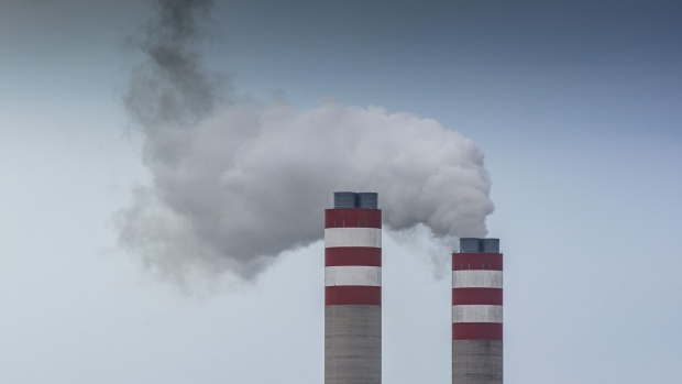 Emissions rise from towers of the Eskom Holdings SOC Ltd. Kusile coal-fired power station in Mpumalanga, South Africa, on Monday, Dec. 23, 2019. The level of sulfur dioxide emissions in the Kriel area in Mpumalanga province only lags the Norilsk Nickel metal complex in the Russian town of Norilsk, the environmental group Greenpeace said in a statement, citing 2018 data from NASA satellites. Photographer: Waldo Swiegers/Bloomberg