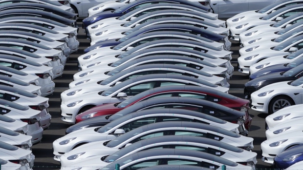 Tesla Inc. vehicles in a parking lot after arriving at a port in Yokohama, Japan, on Monday, May 10, 2021. Tesla sold a record of almost 185,000 vehicles in the first three months of the year despite having issues rolling out new versions of the Model S and X. Photographer: Toru Hanai/Bloomberg