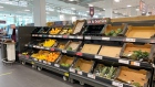 Empty shelves in the fresh fruit aisle at a J Sainsbury Plc in London, U.K., on Friday, July 23, 2021. The U.K. government is rolling out daily Covid testing to allow workers in supermarket depots and food manufacturers to avoid self-isolation, amid concerns that mass staff shortages are threatening crucial supplies.