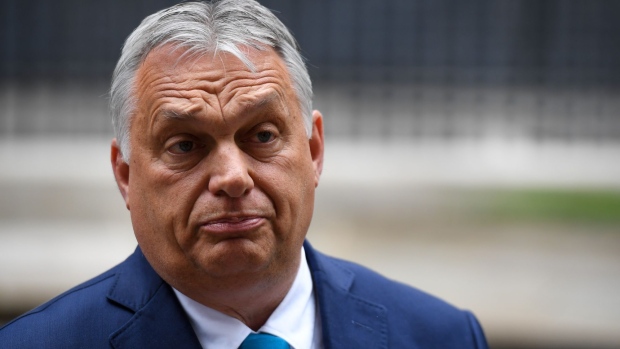 Viktor Orban, Hungary's prime minister, speaks to member of the media outside number 10 Downing Street, following his bilateral meeting with Boris Johnson, U.K. prime minister, in London, U.K., on Friday, May 28, 2021. Johnson's meeting with Orban, is one of the British leader's first in-person meetings with a European Union leader since Brexit and the coronavirus pandemic. Photographer: Chris J. Ratcliffe/Bloomberg