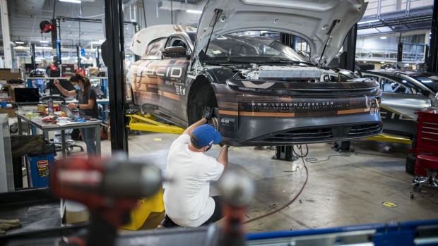 Workers assemble the Lucid Air prototype electric vehicle, manufactured by Lucid Motors Inc., at the company's headquarters in Newark, California.