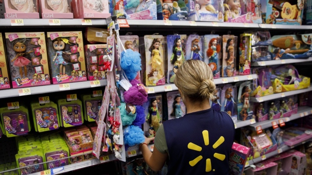 An employee stocks toys at a Walmart Inc. store in Burbank, California, U.S., on Monday, Nov. 19, 2018. To get the jump on Black Friday selling, retailers are launching Black Friday-like promotions in the weeks prior to the event since competition and price transparency are forcing retailers to grab as much share of the consumers' wallet as they can. Photographer: Patrick T. Fallon/Bloomberg