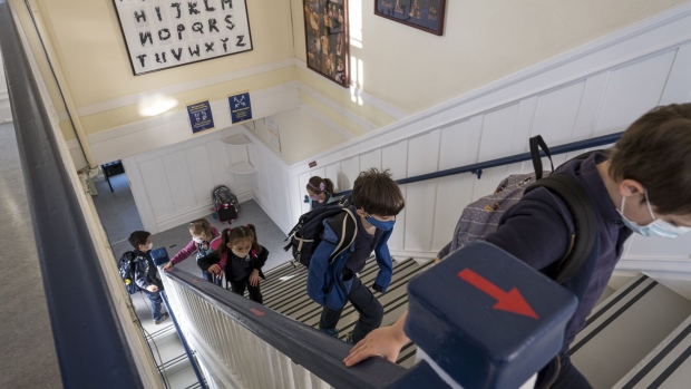 Students wearing protective masks at an elementary school in San Francisco. Photographer: David Paul Morris/Bloomberg