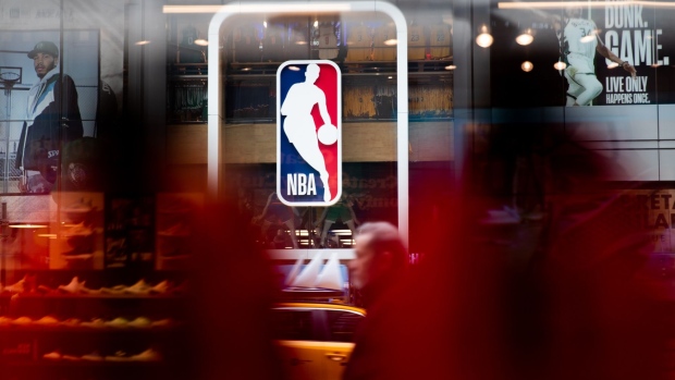 NEW YORK, NY - MARCH 12: An NBA logo is shown at the 5th Avenue NBA store on March 12, 2020 in New York City. The National Basketball Association said they would suspend all games after player Rudy Gobert of the Utah Jazz reportedly tested positive for the Coronavirus (COVID-19). (Photo by Jeenah Moon/Getty Images) Photographer: Jeenah Moon/Getty Images North America