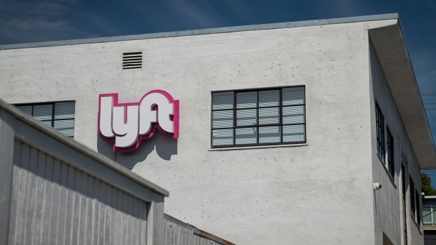 Signage is displayed at the Lyft driver hub building in San Francisco, California, U.S., on Monday, May 4, 2020. Lyft Inc. withdrew its profit and revenue forecasts for 2020, following rival Uber Technologies Inc. in citing evolving and unpredictable impacts from Covid-19. Photographer: David Paul Morris/Bloomberg