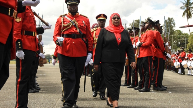 Samia Hassan inspects a military honor guard following her swearing-in ceremony in Dar es Salaam, Tanzania, on March 19. Photographer: STR/AFP/Getty Images