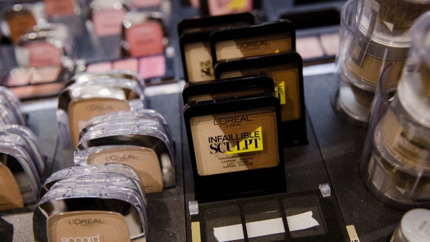 L'Oreal cosmetic products sit on display in a department store in Paris, France.