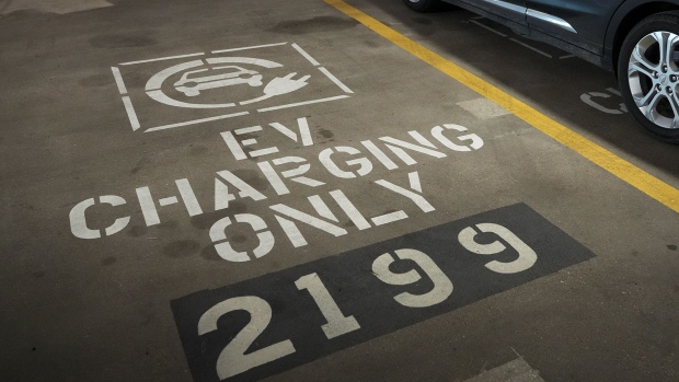 Electric vehicle parking spot in Washington, D.C. Photographer: Drew Angerer/Getty Images