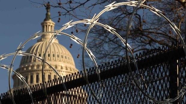 WASHINGTON, DC - JANUARY 14: Concertina razor wire tops the 8-foot 'non-scalable' fence that surrounds the U.S. Capitol the day after the House of Representatives voted to impeach President Donald Trump for the second time January 14, 2021 in Washington, DC. Thousands of National Guard troops have been activated to protect the nation's capital against threats surrounding President-elect Joe Biden’s inauguration and to prevent a repeat of last week’s deadly insurrection at the U.S. Capitol. (Photo by Chip Somodevilla/Getty Images) Photographer: Chip Somodevilla/Getty Images North America