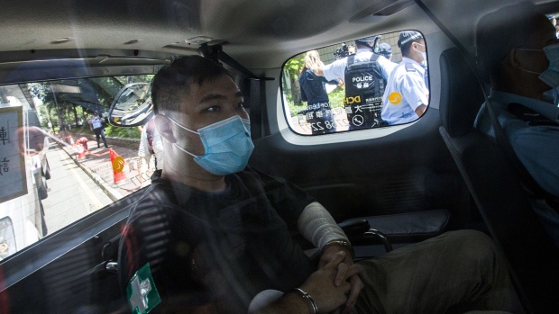 Hong Kong defendant Tong Ying-Kit, 23, arrives at court after being accused of deliberately driving his motorcycle into a group of police officers last Wednesday on July 6, 2020 in Hong Kong, China. Tong is the first person to be charged for incitement to secession and terrorist activities under the Hong Kong national security law. (Photo by Getty Images/Getty Images)