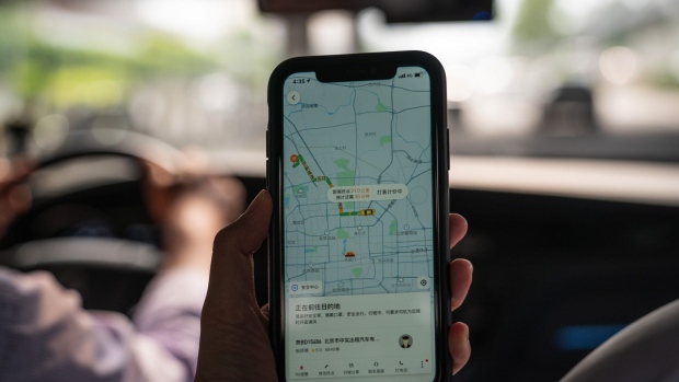The Didi ride-hailing app on a smartphone arranged in Beijing, China, on Monday, July 5, 2021. China expanded its latest crackdown on the technology industry beyond Didi to include two other companies that recently listed in New York, dealing a blow to global investors while tightening the government’s grip on sensitive online data.