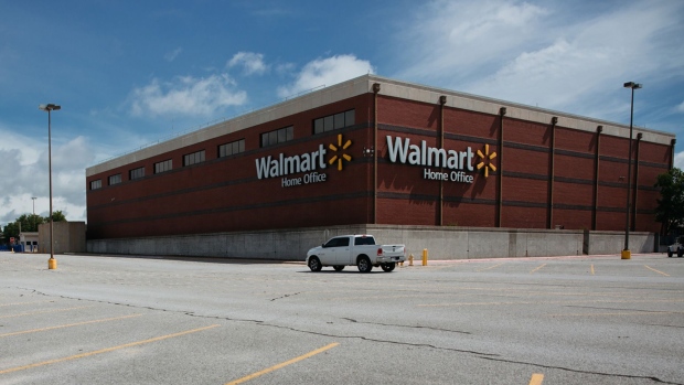 A nearly empty parking lot stands outside the Walmart Inc. World Headquarters in Bentonville, Arkansas, U.S., on Thursday, May 28, 2020. The annual Walmart Inc. shareholder celebration attracts a varied crowd who pour money into the hotels, bars and restaurants in and around the retailer's hometown of Bentonville, Arkansas. The Covid-19 pandemic forced Walmart to pivot to a virtual gathering on June 3.