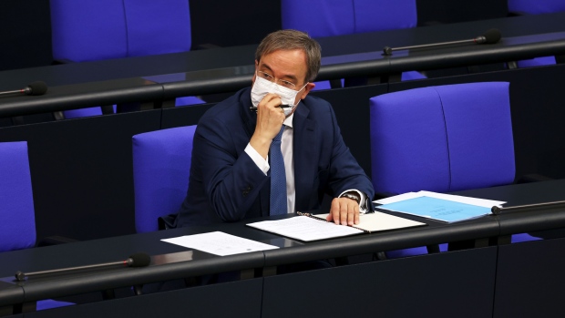 Armin Laschet, leader of the Christian Democratic Union (CDU), wears a protective face mask in the Bundestag in Berlin, Germany, on Thursday, June 24, 2021. Chancellor Angela Merkel's speech today could very well be her last in the Bundestag.
