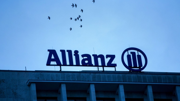 The Allianz SE logo sits on a top of a building in Berlin, Germany, on Wednesday, Jan. 4, 2017. Germany had another year of firm growth in 2016 and should continue to be propelled in 2017 by consumer spending. Photographer: Krisztian Bocsi/Bloomberg