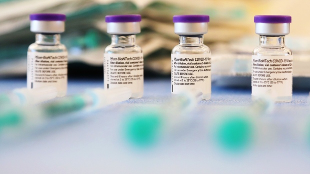 Vials of the Pfizer-BioNTech Covid-19 vaccine at a senior citizen care home in Premnitz, Germany, on Wednesday, Dec. 30, 2020. Germany’s new coronavirus deaths surpassed 1,000 for the first time since the beginning of the pandemic, just days after the country started its vaccination campaign. Photographer: Liesa Johannssen-Koppitz/Bloomberg