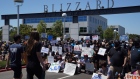 Employees gather for a group photo during a walkout at Activision Blizzard offices in Irvine, California on July 28. Photographer: Bing Guan/Bloomberg