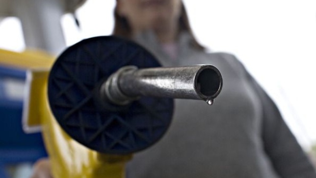 UNITED STATES - MAY 15: A drop of E85, a mixture of 85 percent ethanol and gasoline, hangs at the end of a gas pump held for a photograph by Katie Hitt at a Mobil station in Birmingham, Michigan, U.S., on Thursday, May 15, 2008. Prices for wheat, corn and soybeans have climbed to records, partly on demand for the grains to make fuels such as ethanol as an alternative to crude oil. (Photo by Daniel Acker/Bloomberg via Getty Images) Photographer: Bloomberg/Bloomberg