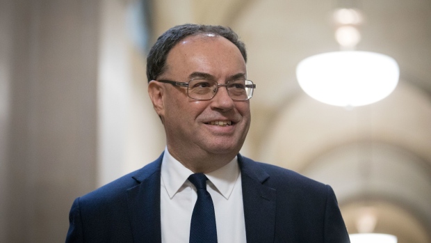 Andrew Bailey, governor of the Bank of England, poses for a photograph on his first day in the post at the central bank in the City of London, U.K., on Monday, March 16, 2020. Bailey knows a few things about crises, which should put him good stead on Monday when he takes the helm of the Bank of England as it tries to stave off recession triggered by the coronavirus pandemic.
