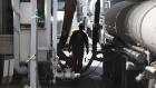 A worker pumps gasoline into a tanker truck at a Marathon Petroleum oil refinery during a driver shortage in Salt Lake City, Utah, U.S., on Thursday, July 15, 2021. Fuel-hauling companies that reduced staff during the pandemic are struggling to hire back drivers that found jobs elsewhere. Photographer: George Frey/Bloomberg