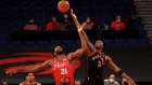 TAMPA, FLORIDA - FEBRUARY 21: Joel Embiid #21 of the Philadelphia 76ers and OG Anunoby #3 of the Toronto Raptors jump ball during a game at Amalie Arena on February 21, 2021 in Tampa, Florida. (Photo by Mike Ehrmann/Getty Images) NOTE TO USER: User expressly acknowledges and agrees that, by downloading and or using this photograph, User is consenting to the terms and conditions of the Getty Images License Agreement.