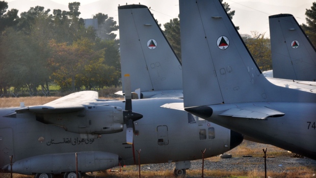 Broken-down G222 transport planes parked next to the runway at Kabul International Airport before they were scrapped.