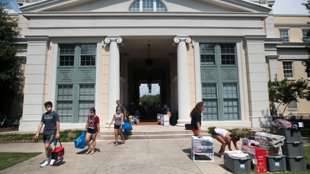 COLUMBIA, SC - AUGUST 10: Students and their families move belongings at a campus dormitory at the University of South Carolina on August 10, 2020 in Columbia, South Carolina. Students began moving back to campus housing August 9 with classes to start August 20. (Photo by Sean Rayford/Getty Images)