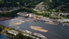 Rafts of logs and timber beside a saw mill on the coast of Vancouver Island in Chemainus, British Columbia, Canada, on Monday, May 10, 2021. DP World and the Port of Nanaimo have entered into a 50-year lease agreement for Nanaimo's Duke Point Shipping Terminal. Photographer: James MacDonald/Bloomberg
