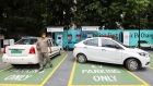 An electric vehicle (EV) vehicle is parked in a bay at a charging station operated by Energy Efficiency Services Ltd. (EESL), a joint venture between four state-run power companies -- NTPC Ltd., Power Grid Corp., Power Finance Corp. and REC Ltd., in New Delhi, India, on Tuesday, Aug. 25, 2020. India aspires to rapidly scale-up local manufacturing and adoption of electric vehicles to raise its competitiveness in the global auto-manufacturing industry as well as to tackle its high fuel import bill and urban pollution. Photographer T. Narayan/Bloomberg Photographer: T. Narayan/Bloomberg