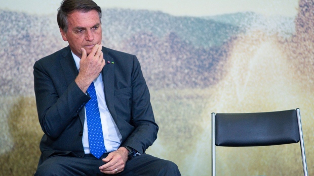 Jair Bolsonaro, Brazil's president, during the launch event of the Banco do Brasil SA Agro Investment Program at Planalto Palace in Brasilia, Brazil, on Tuesday, Aug. 24, 2021. Bolsonaro is growing uneasy about Brazil’s inflation in the run-up to general elections next year, but his complaints about rising prices don’t mean he plans to interfere with the central bank, according to five people close to him including cabinet members.