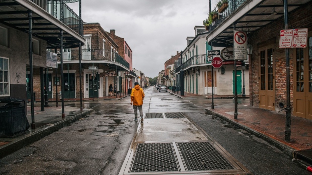 A pedestrian walks through the French Quarter ahead of Hurricane Ida in New Orleans, Louisiana, on Aug. 29, 2021.